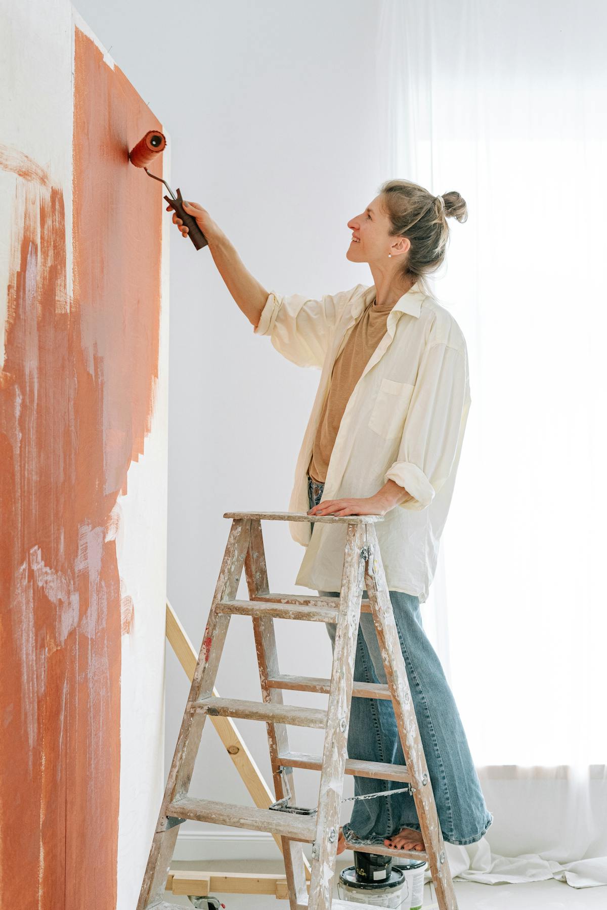 Painter working inside a home